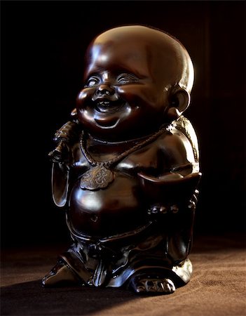 pictures of fat man in india - Smiling Buddha brings light to give you some happiness Stock Photo - Budget Royalty-Free & Subscription, Code: 400-05047753