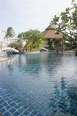 Swimming pool and gardens at a tropical resort in Thailand. Stock Photo - Budget Royalty-Free & Subscription, Code: 400-05047800