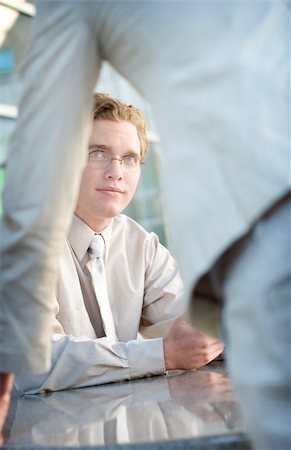position afraid - rear view of woman in front of man sitting at table Stock Photo - Budget Royalty-Free & Subscription, Code: 400-05047836