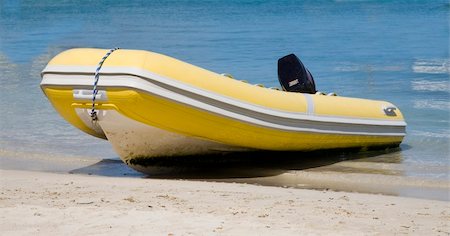 Yellow dingy on beach in the Virgin Islands Stock Photo - Budget Royalty-Free & Subscription, Code: 400-05047867