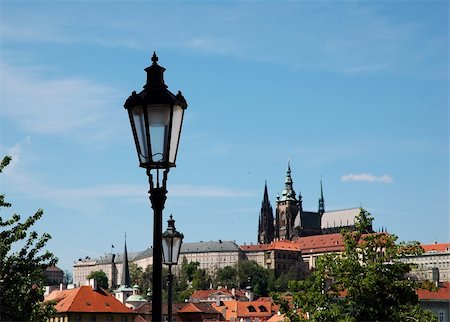 simsearch:400-06919081,k - Prague castle and a detail of ancient lantern Stockbilder - Microstock & Abonnement, Bildnummer: 400-05048527