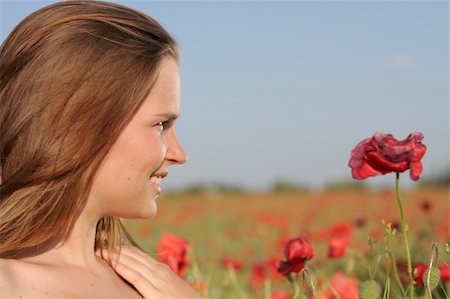 side lips view pictures - Girl in poppy field - very nice portrait Stock Photo - Budget Royalty-Free & Subscription, Code: 400-05048687