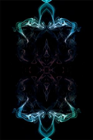 abstract picture of coloured smoke on the black background Foto de stock - Royalty-Free Super Valor e Assinatura, Número: 400-05048698