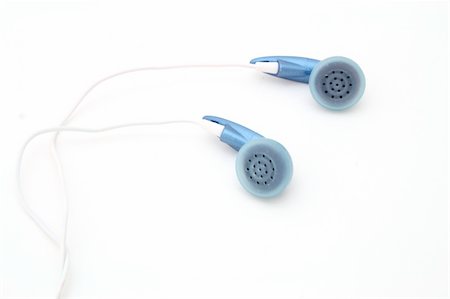 simsearch:400-04434331,k - blue ear phones over a white surface Photographie de stock - Aubaine LD & Abonnement, Code: 400-05048901