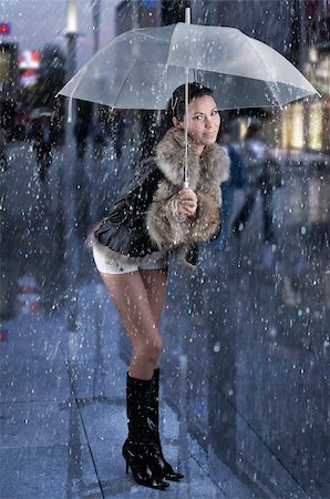 pretty brunette black boot white short under white umbrella Stock Photo - Budget Royalty-Free & Subscription, Code: 400-05049147