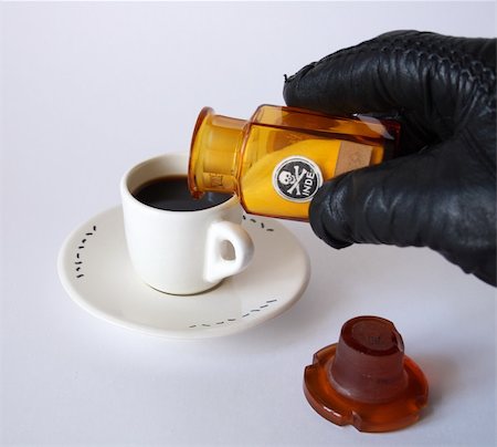 Hand in black leather glove strewed poison in cup of coffee Photographie de stock - Aubaine LD & Abonnement, Code: 400-05049554