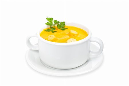 simsearch:400-07092695,k - Carrots puree with bread croutons and parsley, on white cup with soft shadow over white background. Shallow DOF Fotografie stock - Microstock e Abbonamento, Codice: 400-05049801