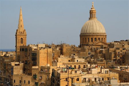 photos of the knights of malta - Yellow hauses of Valetta, Malta and St. Paul's Angclican Cathedral and Carmelite Church Stock Photo - Budget Royalty-Free & Subscription, Code: 400-05049834
