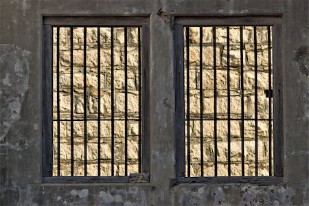 hopeless outside the jail cell is a stone wall Stock Photo - Budget Royalty-Free & Subscription, Code: 400-05040074