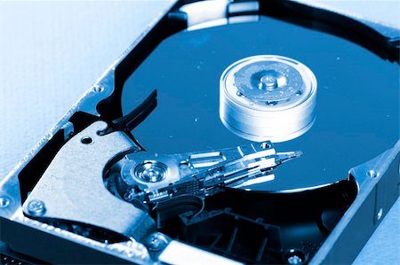 simsearch:400-03992953,k - Macro photo - Hard Disk Drive. Great details ! Stock Photo - Budget Royalty-Free & Subscription, Code: 400-05040106