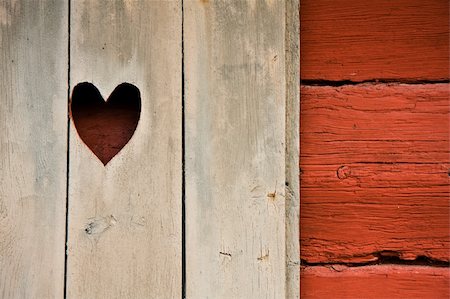 shutters for log cabins - Heart symbol in a cottage's shutter Stock Photo - Budget Royalty-Free & Subscription, Code: 400-05040770