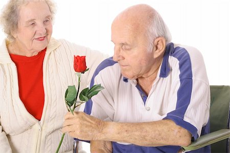 wife giving handicap husband a rose Stock Photo - Budget Royalty-Free & Subscription, Code: 400-05040944