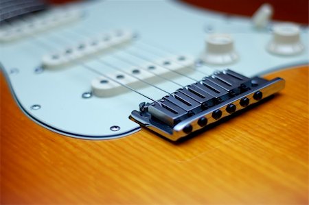 pickup truck materials - Close-up of a Fender American Deluxe guitar bridge Stock Photo - Budget Royalty-Free & Subscription, Code: 400-05041358