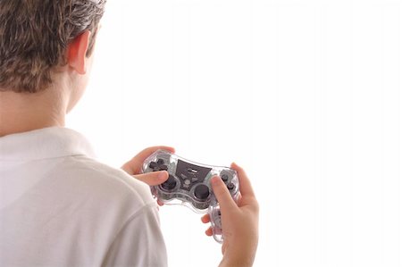 child playing video games from behind Stock Photo - Budget Royalty-Free & Subscription, Code: 400-05041687