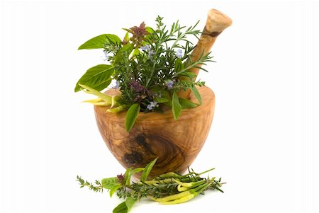 simsearch:400-04544414,k - Healing herbs and edible flowers (handcarved olive tree mortar and pestle) Stock Photo - Budget Royalty-Free & Subscription, Code: 400-05041707