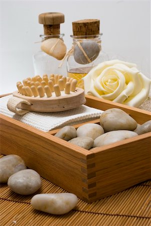 smithesmith (artist) - Accessories for wellness, spa or relaxing bath and Bottle with aromatic oil-accessory of weakening and improving procedures of aromatherapy - Zen stones Stock Photo - Budget Royalty-Free & Subscription, Code: 400-05041905