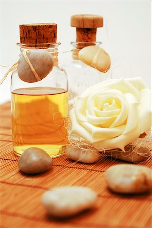 smithesmith (artist) - Bottle with aromatic oil soap  for wellness and Zen stones Stock Photo - Budget Royalty-Free & Subscription, Code: 400-05041903