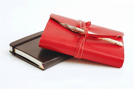 simsearch:400-04686624,k - An old red diary with a calligraphy pen on top -  white background Photographie de stock - Aubaine LD & Abonnement, Code: 400-05042097