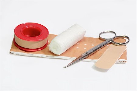 simsearch:400-05242638,k - First aid kit and bandage on a bright background. Stock Photo - Budget Royalty-Free & Subscription, Code: 400-05042171