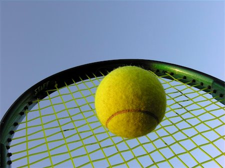 Tennis ball and tennis racket Stock Photo - Budget Royalty-Free & Subscription, Code: 400-05042587