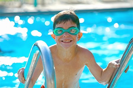 simsearch:400-05045912,k - Boy Coming Out of the Pool on a Sunny Summer Day Stock Photo - Budget Royalty-Free & Subscription, Code: 400-05042977