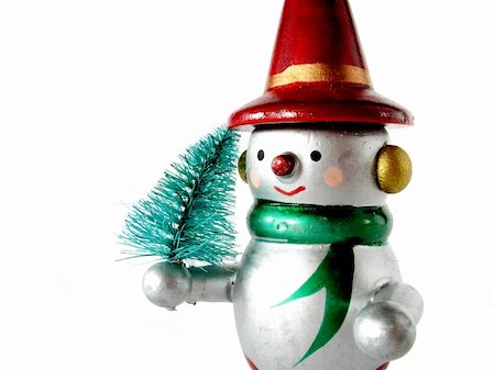 pontuse (artist) - Snow man with a little christmas tree, isolated on white Stockbilder - Microstock & Abonnement, Bildnummer: 400-05043139