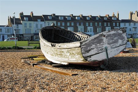 An old weathered boat decaying on a beach Stock Photo - Budget Royalty-Free & Subscription, Code: 400-05043409