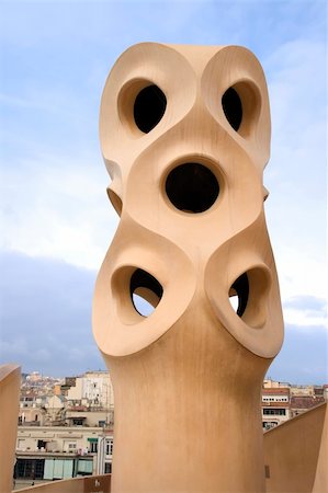 simsearch:400-05253939,k - Abstract ventilation ducts atop the La Pedrera in Barcelona, Spain designed by famous architect Antonio Gaudi and built in 1912. Stock Photo - Budget Royalty-Free & Subscription, Code: 400-05043457