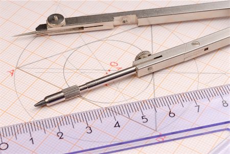 drafting tool - Macro of geometry tools lying on drawing Stock Photo - Budget Royalty-Free & Subscription, Code: 400-05054448