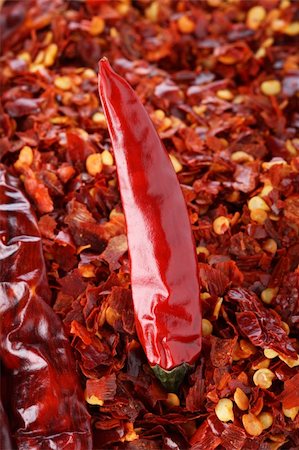 Hot Red Chilli Chillies pepper on red chili background Foto de stock - Royalty-Free Super Valor e Assinatura, Número: 400-05054498