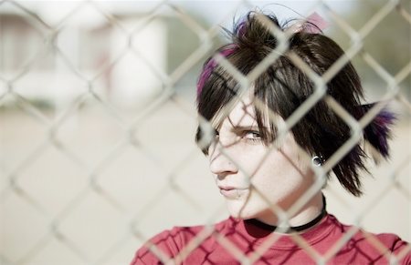 people running away scared - Young Punk Girl Being Shadowed By Chain Link Stock Photo - Budget Royalty-Free & Subscription, Code: 400-05054577