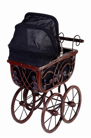 Old fashioned stroller. Taken on white background. Stockbilder - Microstock & Abonnement, Bildnummer: 400-05054967