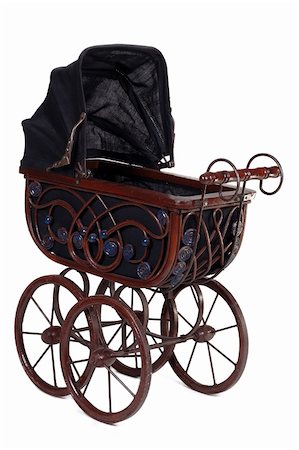 Old fashioned stroller. Taken on white background. Stockbilder - Microstock & Abonnement, Bildnummer: 400-05054968