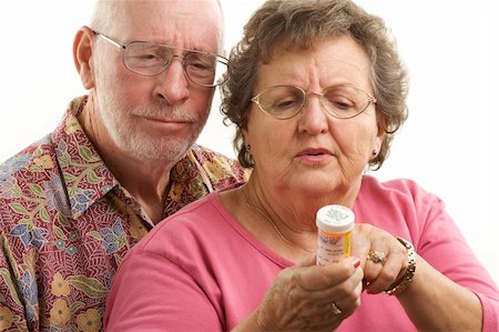 simsearch:400-04522125,k - Senior Couple reads a prescription bottle. Stock Photo - Budget Royalty-Free & Subscription, Code: 400-05055326