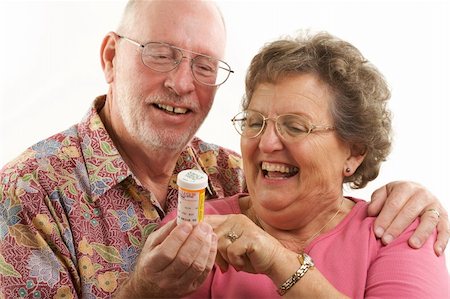 simsearch:400-04522125,k - Senior Couple reads a prescription bottle. Stock Photo - Budget Royalty-Free & Subscription, Code: 400-05055329