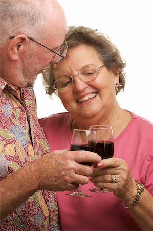 simsearch:400-04522125,k - Happy Senior Couple toasting with Wine glasses. Stock Photo - Budget Royalty-Free & Subscription, Code: 400-05055341