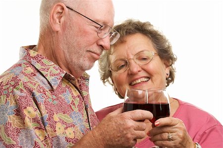 simsearch:400-04522125,k - Happy Senior Couple toasting with Wine glasses. Stock Photo - Budget Royalty-Free & Subscription, Code: 400-05055342