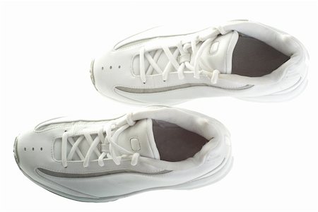 A pair of white basketball shoes isolated on a white background. Stockbilder - Microstock & Abonnement, Bildnummer: 400-05055448