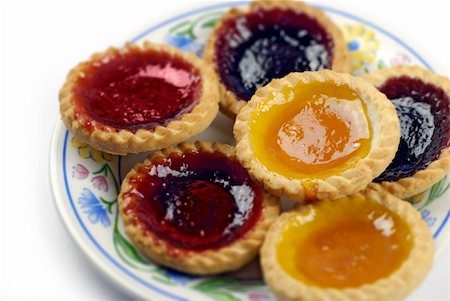 shortcake - plate of delicious jam tarts - the taste of childhood tea parties; differential focus Stock Photo - Budget Royalty-Free & Subscription, Code: 400-05056125