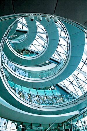 simsearch:400-07062573,k - Blue spiral stairway in the middle of building Stock Photo - Budget Royalty-Free & Subscription, Code: 400-05056195