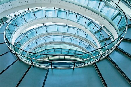 simsearch:400-05024244,k - Round stairway in the middle of office building Fotografie stock - Microstock e Abbonamento, Codice: 400-05056199