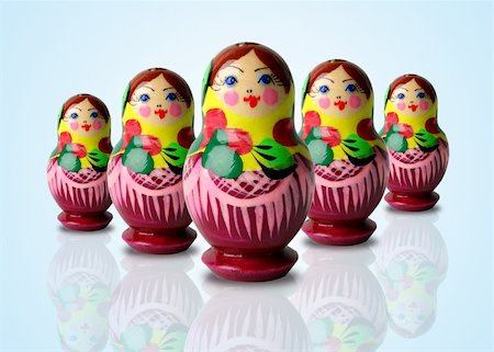 russian dolls - colorful russian doll in white background Stock Photo - Budget Royalty-Free & Subscription, Code: 400-05056615