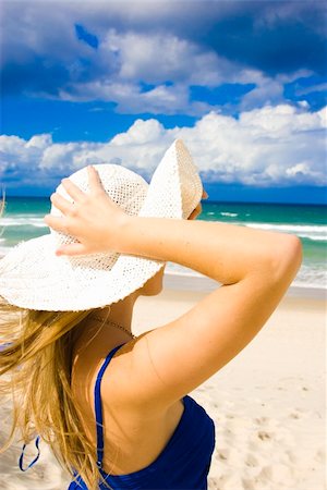 Beautiful girl at the beach for a summer holiday Stock Photo - Budget Royalty-Free & Subscription, Code: 400-05056753
