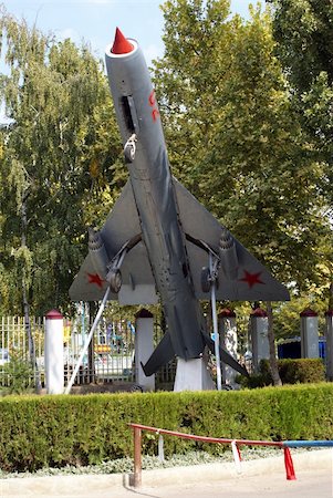 Military airplane MIG near entrance of park in Krasnodar, south Russia Stock Photo - Budget Royalty-Free & Subscription, Code: 400-05056837