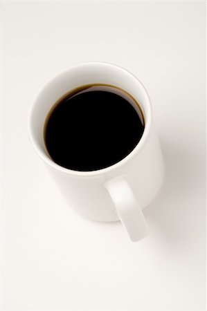 selectphoto (artist) - Black coffee in a white mug on white background Stock Photo - Budget Royalty-Free & Subscription, Code: 400-05057045