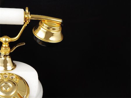 simsearch:400-03986450,k - Half of an ancient luxurious telephone with marble and gold isolated Photographie de stock - Aubaine LD & Abonnement, Code: 400-05057101