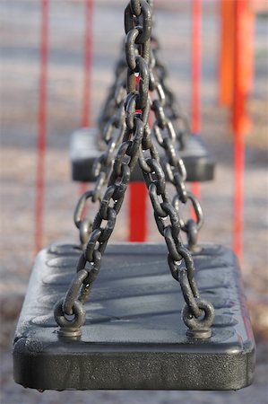 playground swings covered with thawing frost Stock Photo - Budget Royalty-Free & Subscription, Code: 400-05057174