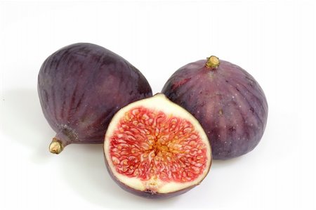 simsearch:695-05771096,k - Two and a half ripe figs on bright background Foto de stock - Super Valor sin royalties y Suscripción, Código: 400-05058253