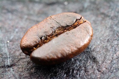 ricepaper - closeup on a single coffee bean placed on black ricepaper Stock Photo - Budget Royalty-Free & Subscription, Code: 400-05058683