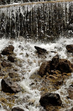 simsearch:400-08410740,k - Small waterfall. Note the water is in motion blur. Photographie de stock - Aubaine LD & Abonnement, Code: 400-05059021